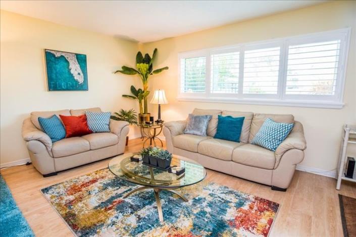 Well decorated living area in Villa 13 in crystal sands siesta key